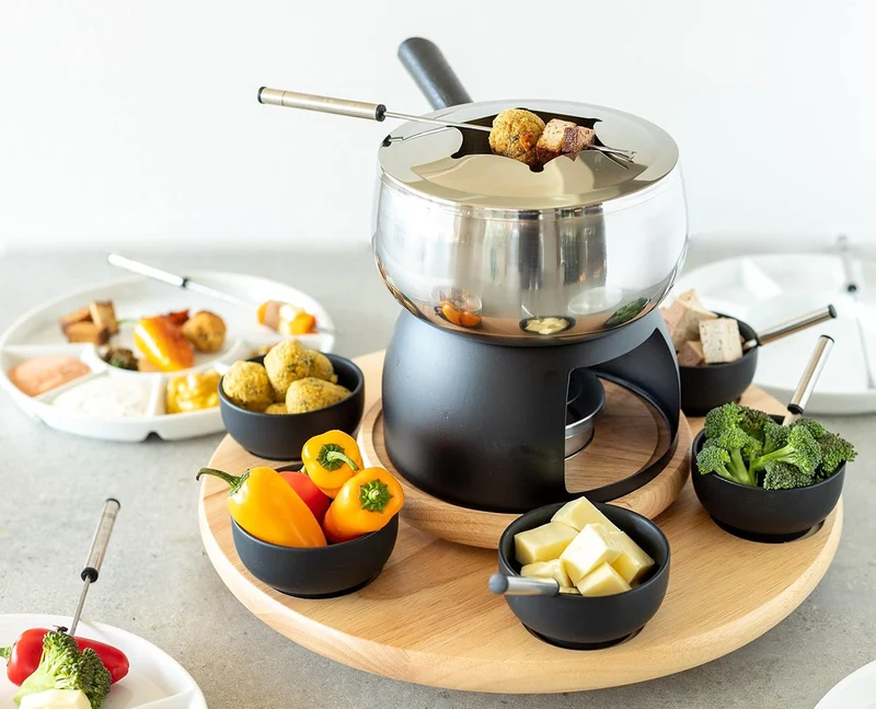 Mäser 931229 Fondue-Set 23-teilig, Edelstahl Fonduetopf inklusive Spritzschutz, Rechaud, Drehkarusse